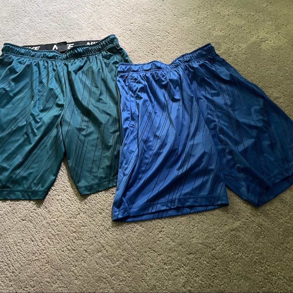2 pairs of mens nike loose fit shorts